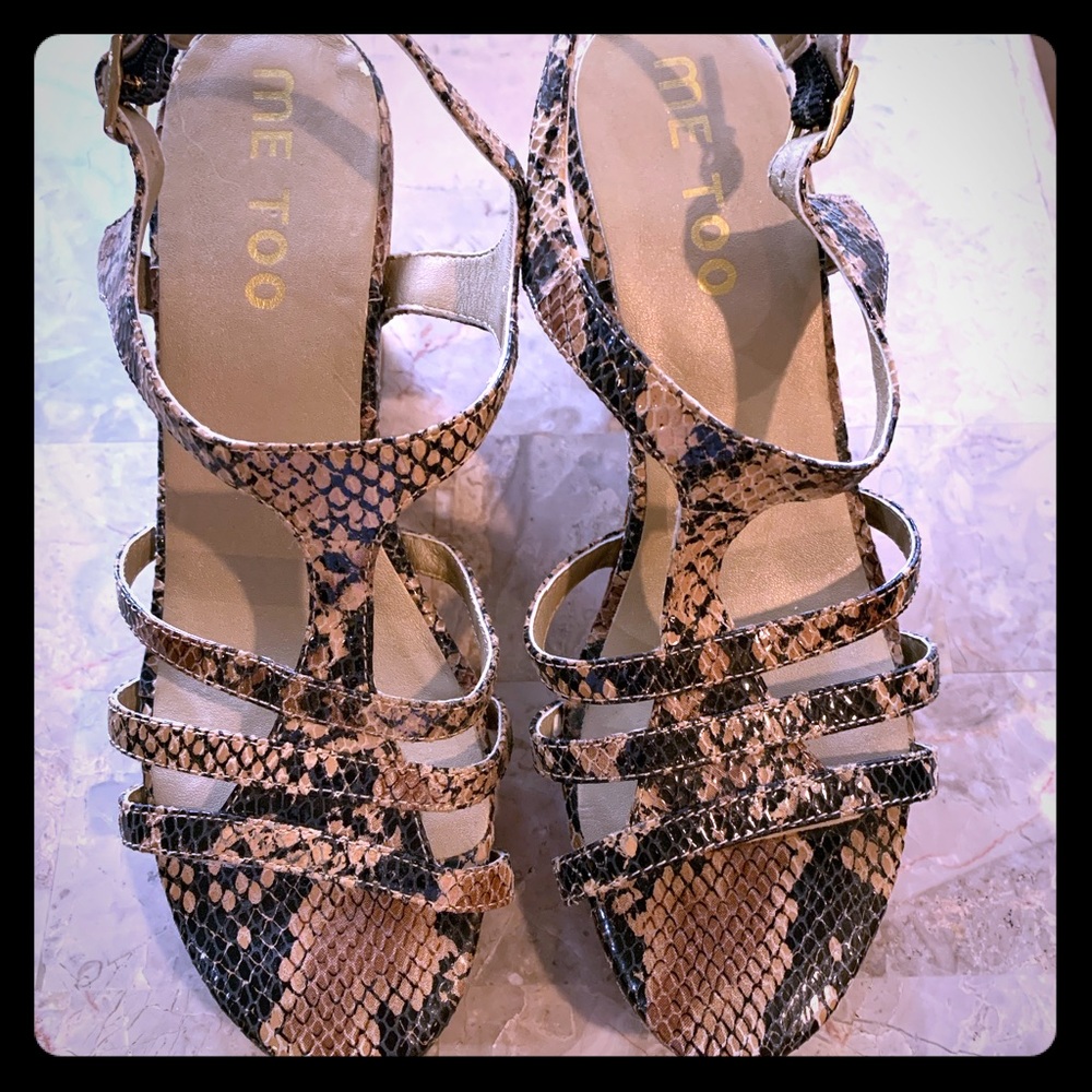 Snake sandals lightly worn